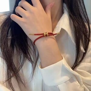 ✨ Red Braided Cable Bracelet with Gold-Tone Accents ✨